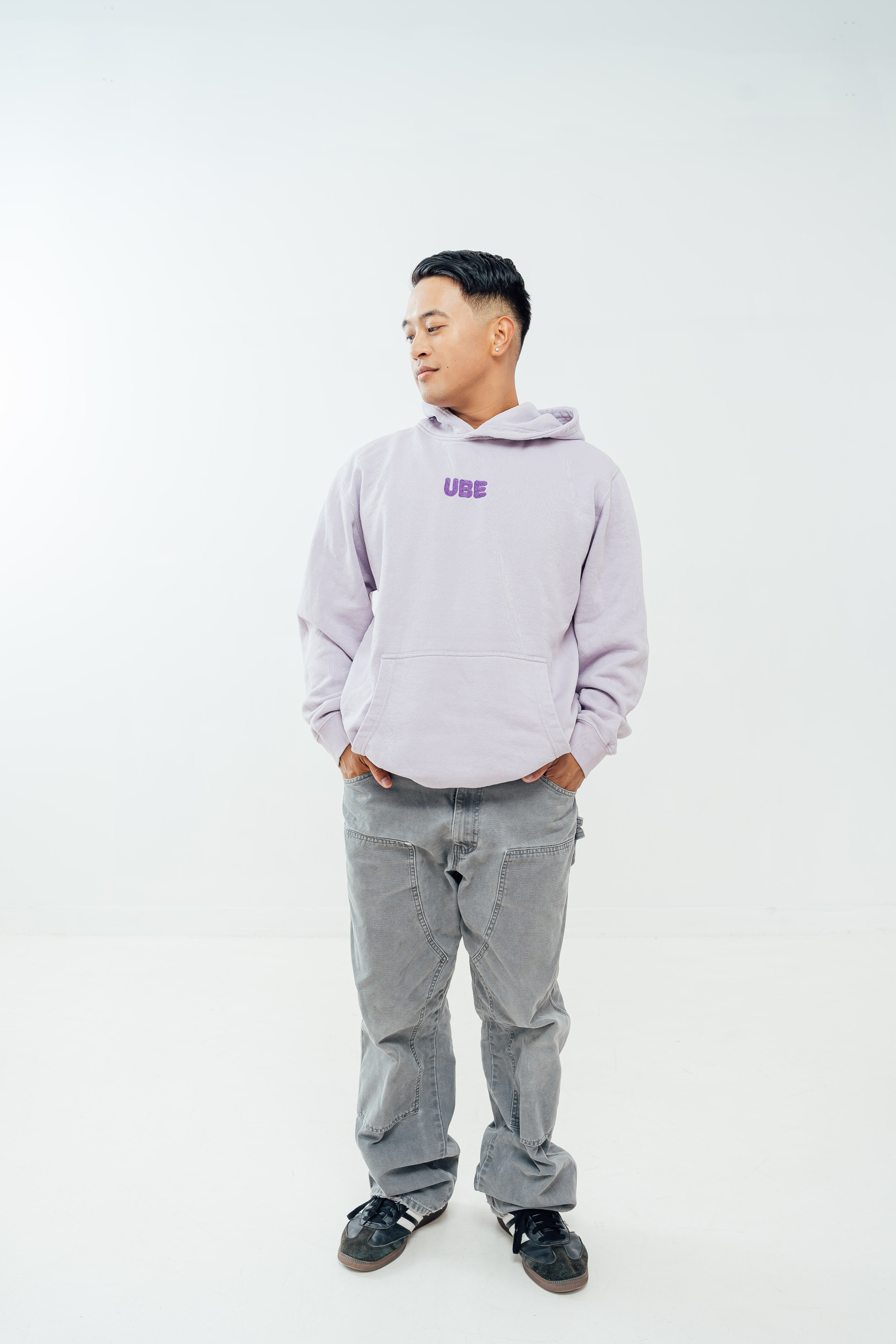 person wearing ube hoodie lifestyle shot